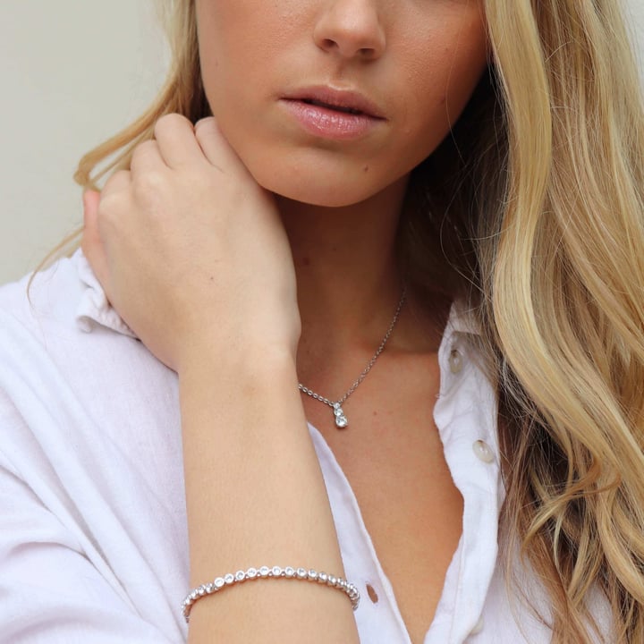 Attract Trilogy Round Pendant with Montana Austrian Crystals Rhodium Plated