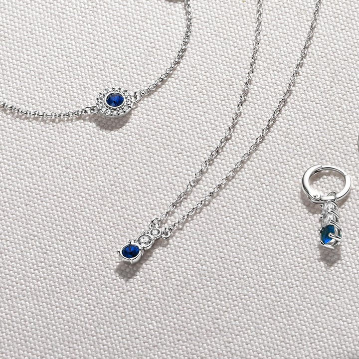 Attract Trilogy Round Pendant with Montana Austrian Crystals Rhodium Plated