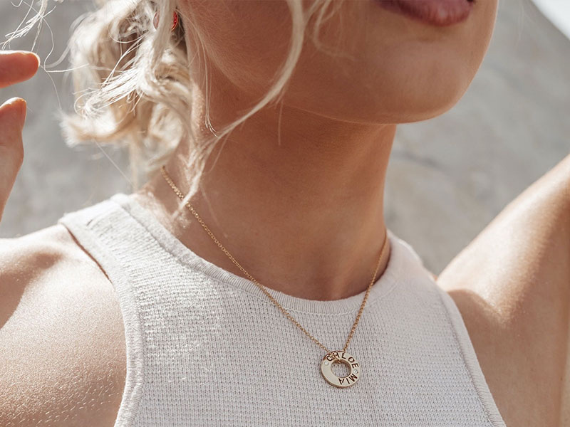 wearing-personalised-holepunched-eternal-circle-necklace-myjewellerystory